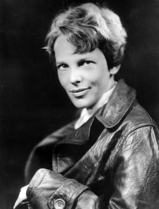 circa 1932: Studio headshot portrait of American aviator Amelia Earhart (1898 - 1937), the first woman to complete a solo transatlantic flight, wearing a leather jacket. (Photo by Hulton Archive/Getty Images)