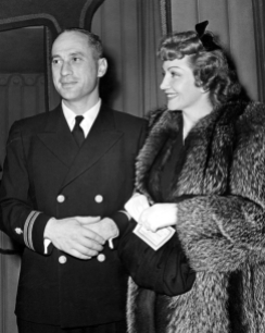 Naval officer JOEL PRESSMAN and wife CLAUDETTE COLBERT at Ciro's, 4/29/42